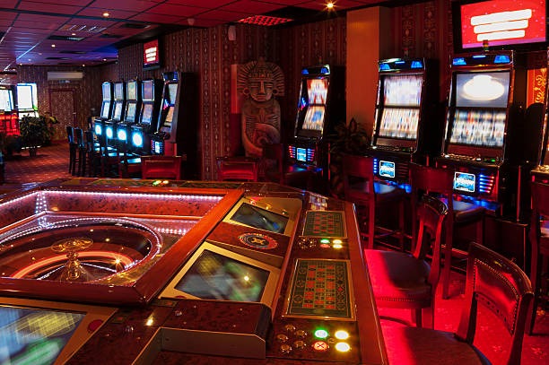 Live casino and slot game interface alongside football tournament information